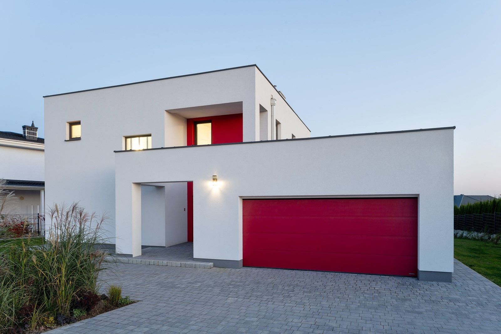 PRIME garage door in the HI FLAME RED colour